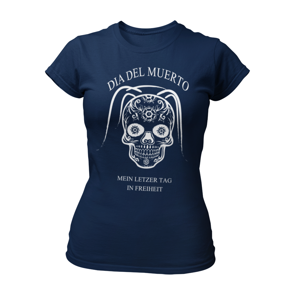 JGA T-Shirt 'Dia del Muerto - Letzter Tag' mit floralem Totenkopf und Schleier im Popart-Stil. Feminin geschnitten, mit kurzen Ärmeln und Rundhalsausschnitt. Erhältlich in mehreren Farben, ideal für Rock n Roller und Hardrocker, um den letzten Tag in Freiheit zu feiern.