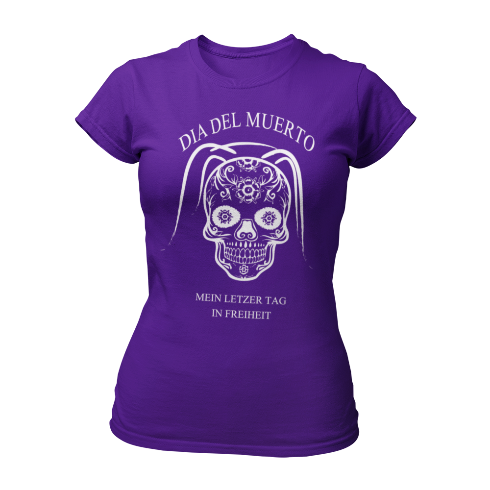 JGA T-Shirt 'Dia del Muerto - Letzter Tag' mit floralem Totenkopf und Schleier im Popart-Stil. Feminin geschnitten, mit kurzen Ärmeln und Rundhalsausschnitt. Erhältlich in mehreren Farben, ideal für Rock n Roller und Hardrocker, um den letzten Tag in Freiheit zu feiern.