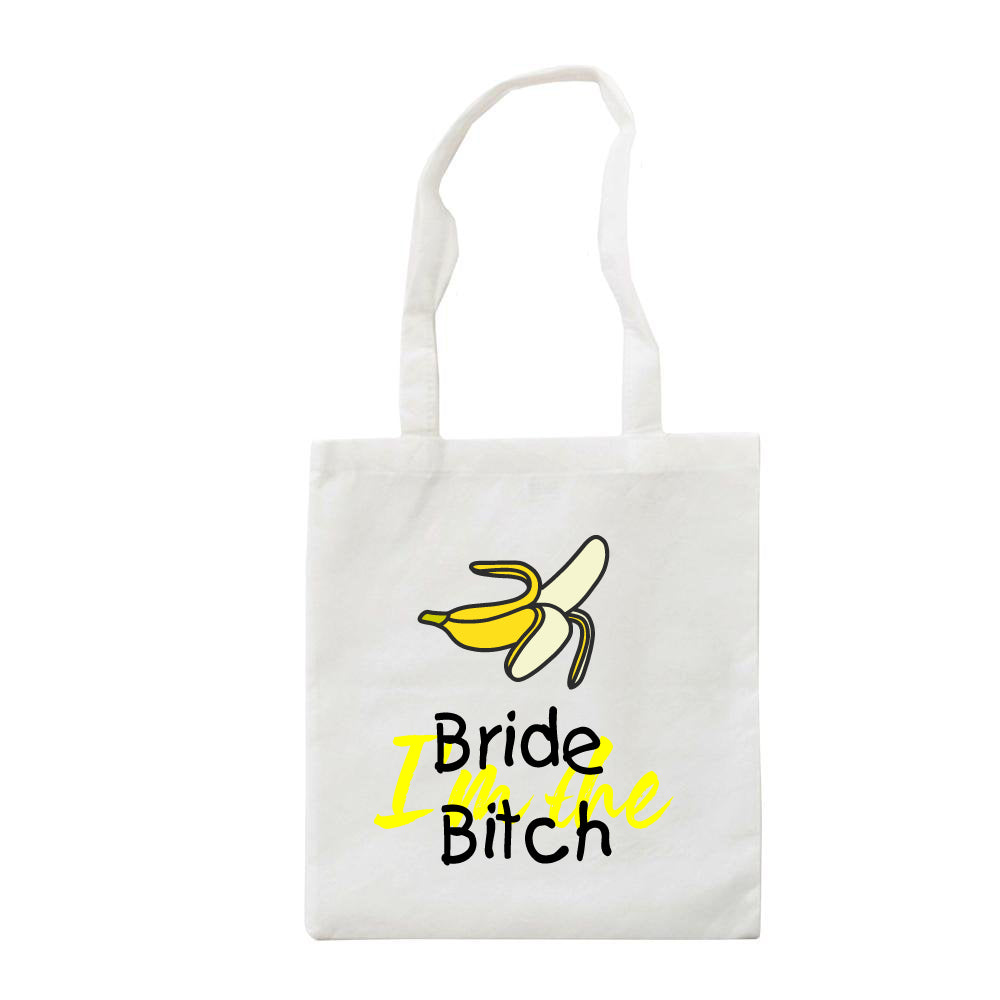 JGA Tasche "I’m the Bride Bitch" aus Stoff mit den Maßen 42 cm x 38 cm, bedruckt mit der Aufschrift „I’m the Bride Bitch“ und einem Bild einer Banane. Der große Beutel ist ideal für alle Utensilien, die am Junggesellinnenabschied benötigt werden, und hat lange Henkel zum bequemen Tragen.
