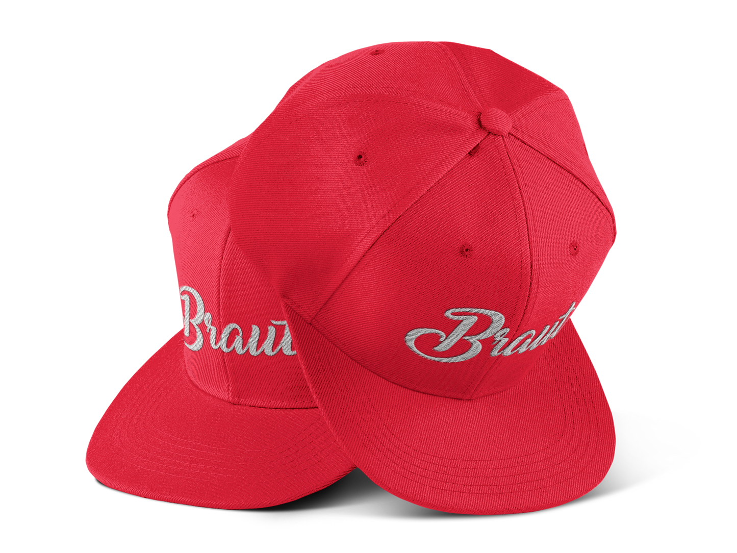 JGA Cap „Braut“ mit flachem Schirm und rotem „Braut“ Schriftzug auf der Vorderseite. Die Kappe hat vier gestickte Ösen für Belüftung und einen größenverstellbaren PVC-Verschluss auf der Rückseite.