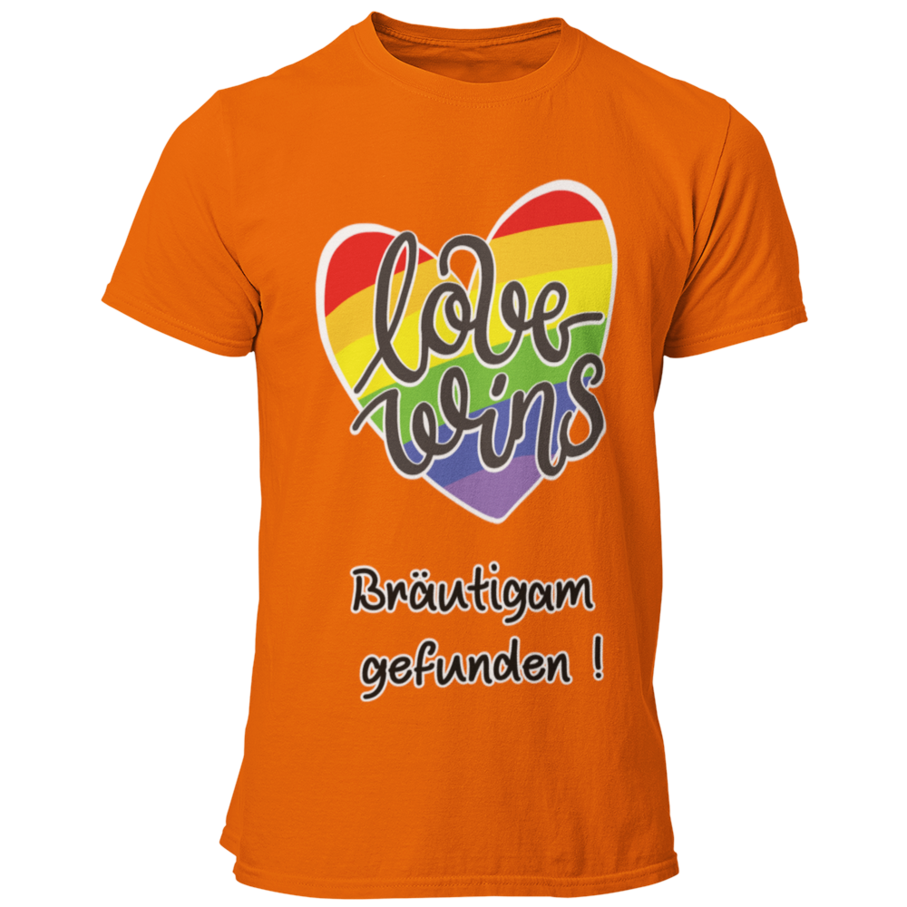  JGA-T-Shirt "Love wins" mit buntem Regenbogenherz und dem Schriftzug „Love wins – Bräutigam gefunden!“. Ideal für den schwulen Junggesellenabschied, um stolz auf die Liebe und die bevorstehende Hochzeit hinzuweisen. Erhältlich in verschiedenen Farben für einen festlichen Regenbogenlook.