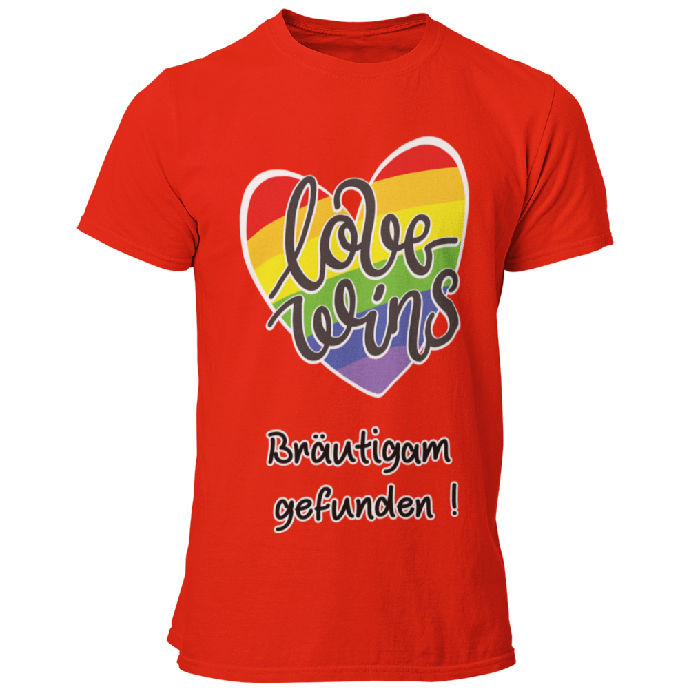  JGA-T-Shirt "Love wins" mit buntem Regenbogenherz und dem Schriftzug „Love wins – Bräutigam gefunden!“. Ideal für den schwulen Junggesellenabschied, um stolz auf die Liebe und die bevorstehende Hochzeit hinzuweisen. Erhältlich in verschiedenen Farben für einen festlichen Regenbogenlook.