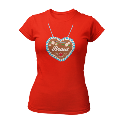 JGA T-Shirt "Lebkuchenherz (Braut)" für Damen, das durch ein auffälliges Design mit einem großen Lebkuchenherz-Aufdruck zum Blickfang auf Junggesellinnenabschieden wird. Das Shirt zeigt in verschnörkelten Buchstaben den Schriftzug "Braut" auf dem Herz. Erhältlich in verschiedenen Farben, bietet es eine taillierte Passform mit kurzen, anliegenden Ärmeln für angenehmen Tragekomfort. Perfekt für die gesamte Mädelsclique, die das "Lebkuchenherz Crew" Shirt trägt. Das Shirt lässt sich ideal mit verschiedenen Acc