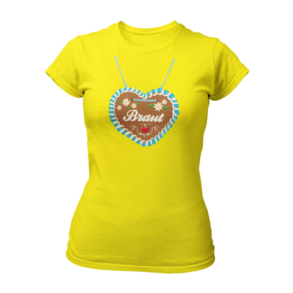 JGA T-Shirt "Lebkuchenherz (Braut)" für Damen, das durch ein auffälliges Design mit einem großen Lebkuchenherz-Aufdruck zum Blickfang auf Junggesellinnenabschieden wird. Das Shirt zeigt in verschnörkelten Buchstaben den Schriftzug "Braut" auf dem Herz. Erhältlich in verschiedenen Farben, bietet es eine taillierte Passform mit kurzen, anliegenden Ärmeln für angenehmen Tragekomfort. Perfekt für die gesamte Mädelsclique, die das "Lebkuchenherz Crew" Shirt trägt. Das Shirt lässt sich ideal mit verschiedenen Acc