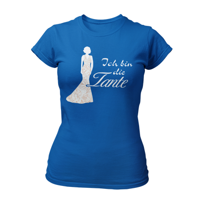 Damen T-Shirt mit der Aufschrift 'Ich bin die Tante' aus der Druckideen-Reihe 'Wer bin ich?'. Das Shirt zeigt eine stilisierte Tante in einem langen, eleganten Abendkleid und gibt einen ersten Eindruck von ihrem Hochzeitsoutfit. Teil einer Reihe, die auch die Designs 'Ich bin die Braut', 'Ich bin die Trauzeugin' und 'Ich bin die Schwester' umfasst. Dieses Shirt fördert das Kennenlernen und sorgt für Spaß beim Junggesellenabschied, während es Gespräche anregt