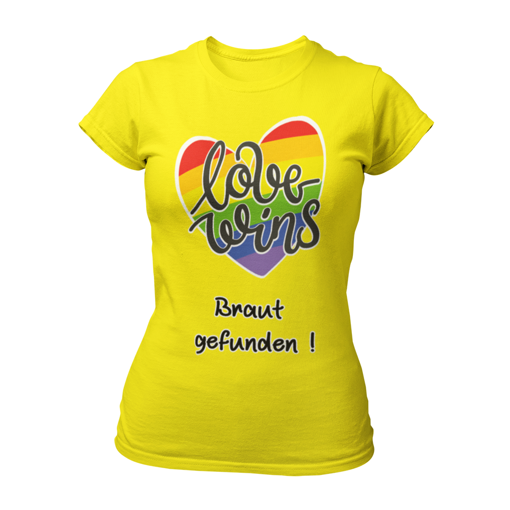 JGA T-Shirt "Love wins! Braut gefunden" für lesbische Paare, in Regenbogenfarben mit dem Schriftzug "love wins" und dem Zusatz "Braut gefunden". Das Shirt hebt die besondere Rolle der angehenden Braut hervor und sorgt mit seinem humorvollen Design und knalligen Farben für gute Laune. Erhältlich in verschiedenen Farben, bietet es eine gute Passform und Waschbeständigkeit zu einem günstigen Preis.