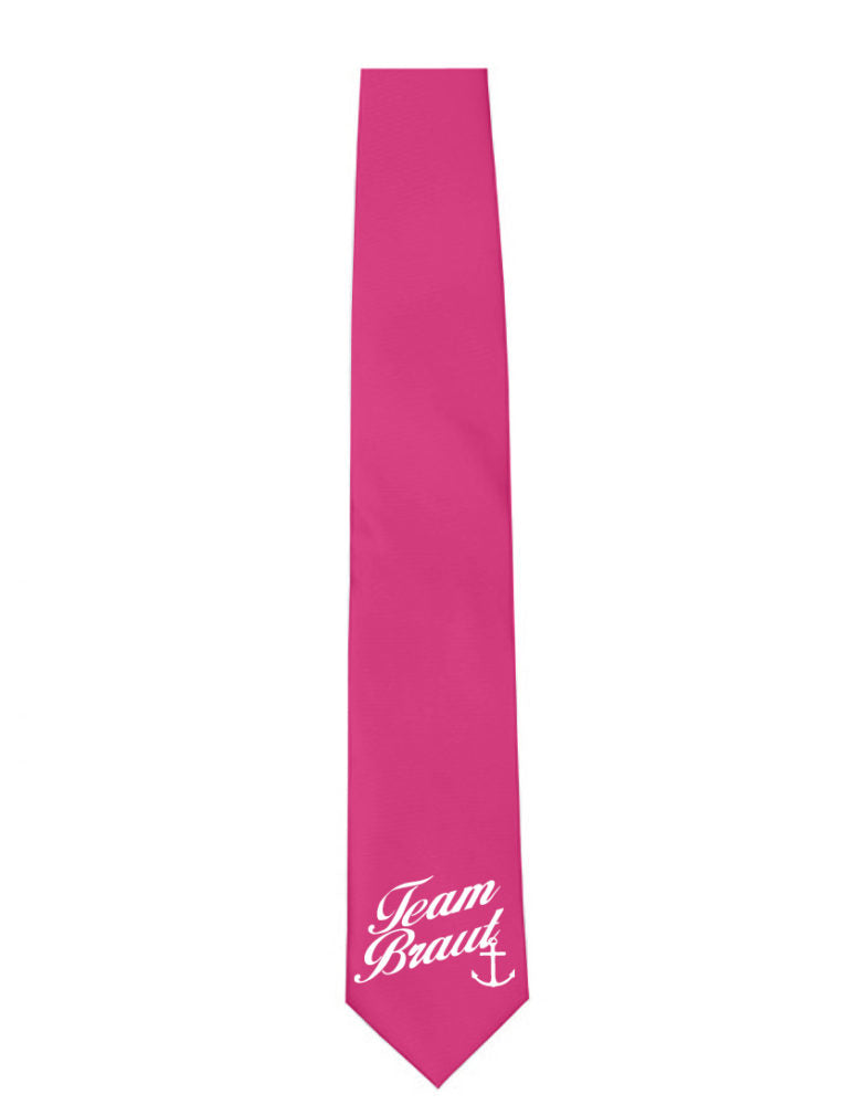 Stylische JGA Krawatte "Team Braut Anker" für Frauen mit dem Aufdruck „Team Braut“ und einem Anker-Motiv. Erhältlich in verschiedenen Farben wie pink, schwarz, weiß und blau. Ideal für den Junggesellinnenabschied, um der Trauzeugin und der gesamten Mädelsgruppe einen eleganten Look zu verleihen. Perfekt für maritime JGA Outfits oder Themenpartys.